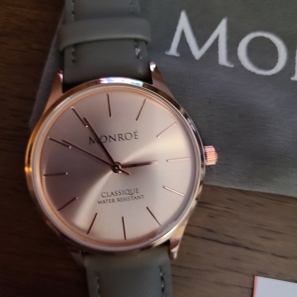 Brand new, never-worn Monroe rose gold watch